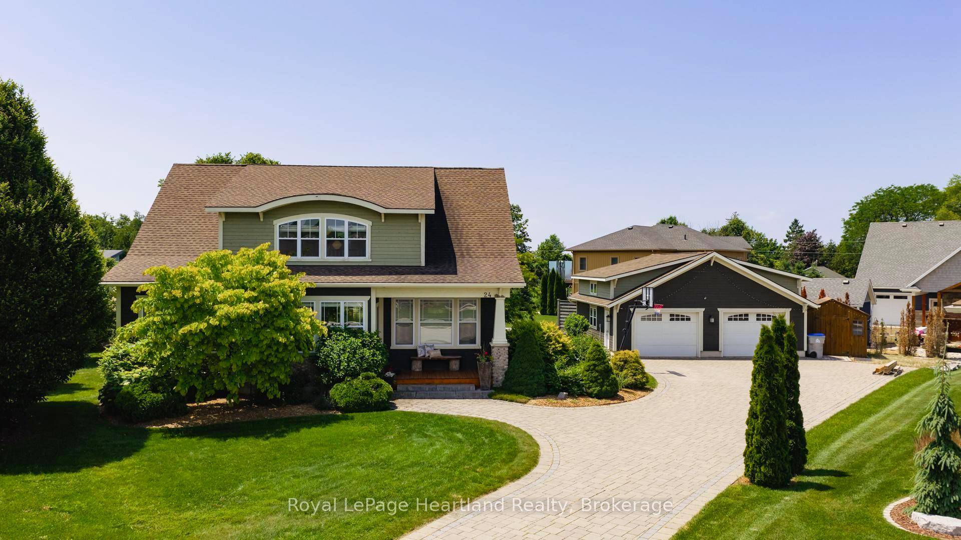 24 Thimbleweed Drive a stunning custom built 4 bed, 4 bath home in one of Bayfield's most prestigious lakeside neighbourhoods.