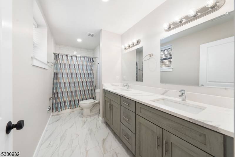 Introducing a brand new two family home built from the ground up by a reputable local builder.