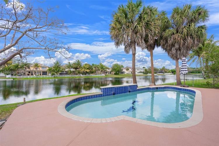 Stunning waterfront home in desirable Silver Falls community !