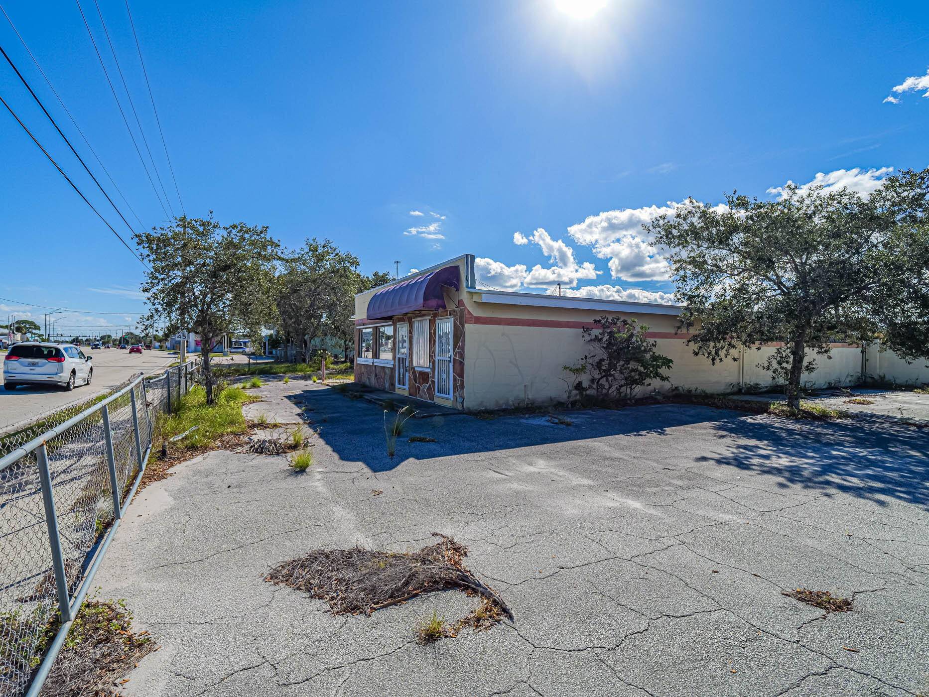 Amazing opportunity to own this 1400 sq ft CBS building with newer roof, Terrazzo floors, great lighting, vaulted ceiling wood trim.