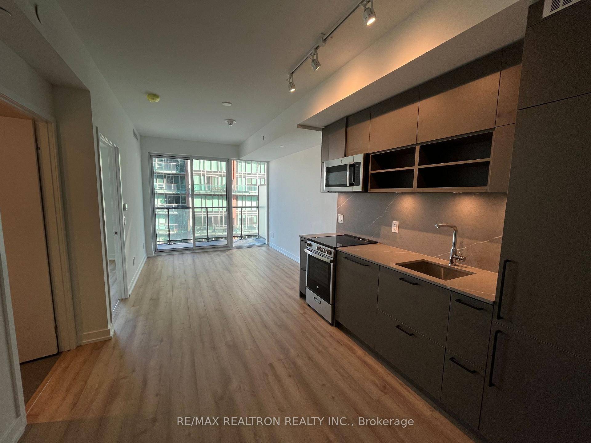 Gorgeous 1 Den in Liberty Market Tower by Lifetime Developments.