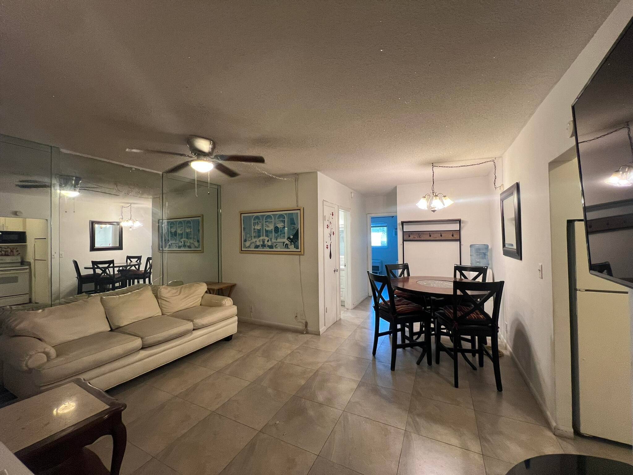 Coastal charm meets everyday convenience in this inviting 2 bedroom, 1 bath condo just a mile and a half from the sand and surf.
