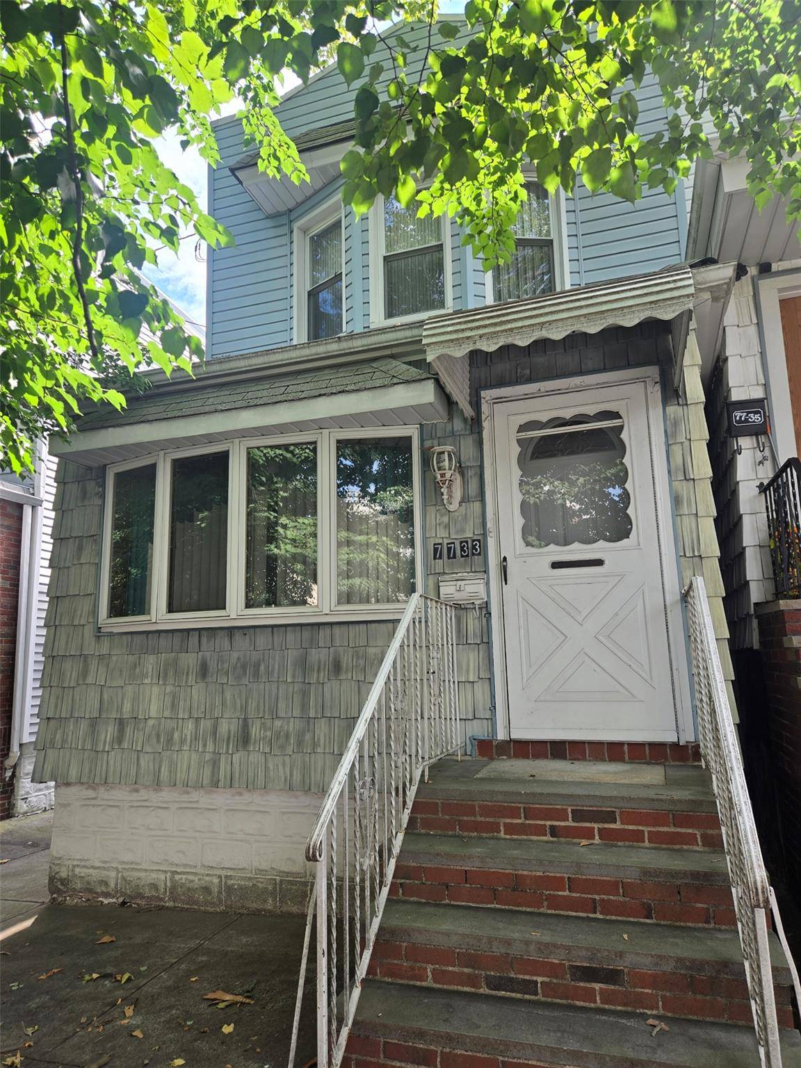 1 Family Semi Detached 1 Car Garage with party driveway.