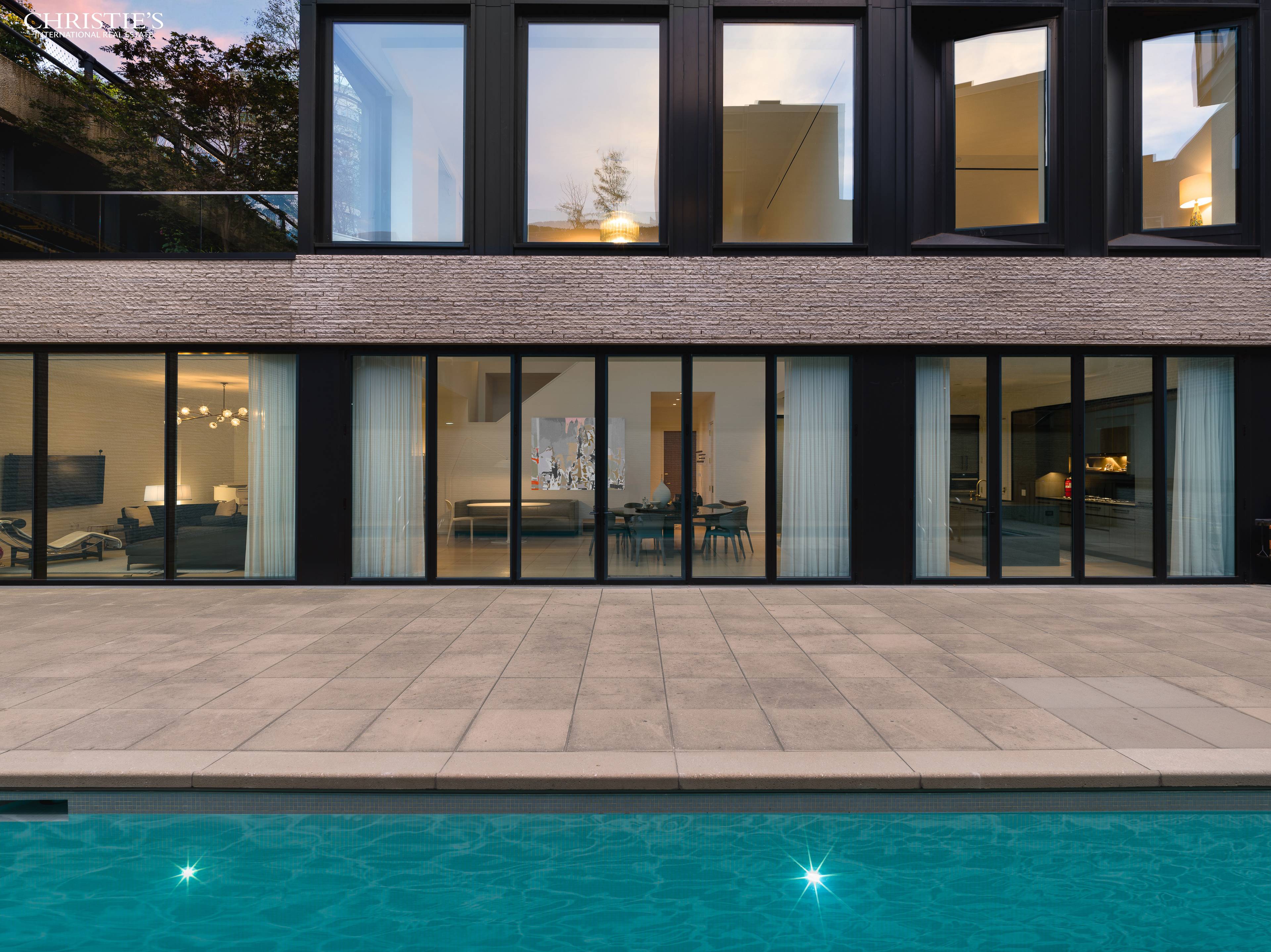 DELUXE DUPLEX CONDO WITH PRIVATE POOL AND GARAGE This spectacular four bedroom, four and one half bathroom home designed by preeminent architect Thomas Juul Hansen in the heart of West ...