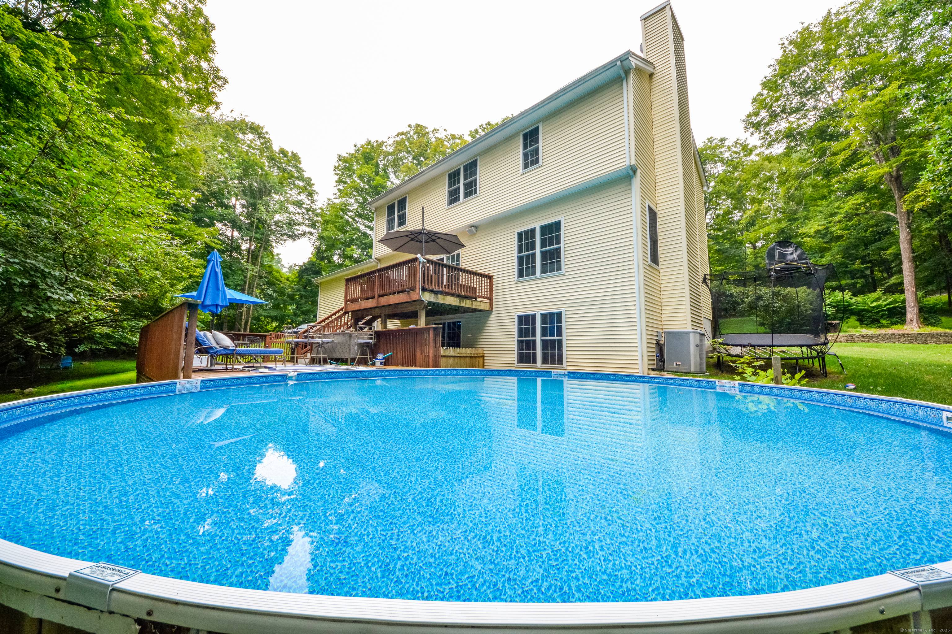 Modern Comforts Amid Natural Beauty Welcome to this masterfully renovated residence, where timeless elegance meets modern convenience.