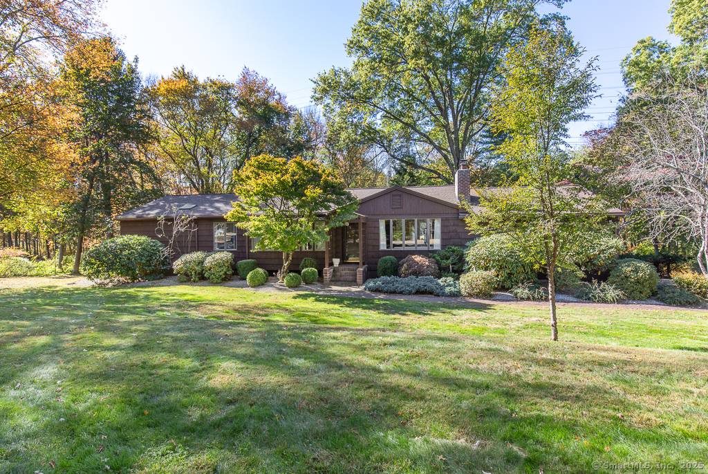 Pride of ownership sparkles throughout this expanded exceptional ranch, perfectly planted in a peaceful pocket neighborhood near Beecher School the Woodbridge Club.