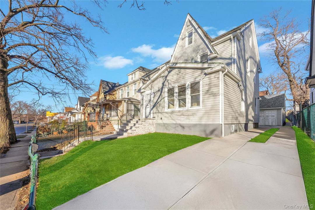 Welcome to 100 35 204th Road, Hollis, NY 11423 Beautiful renovated two family home offering an incredible opportunity for both comfortable living and solid investment.