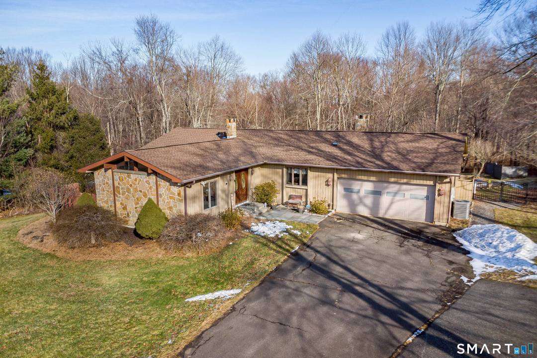 Sprawling ranch style home set on 2 level acres, offering 4 bedrooms and 3 full bathrooms with an inground pool perfect for everyday living and entertaining.