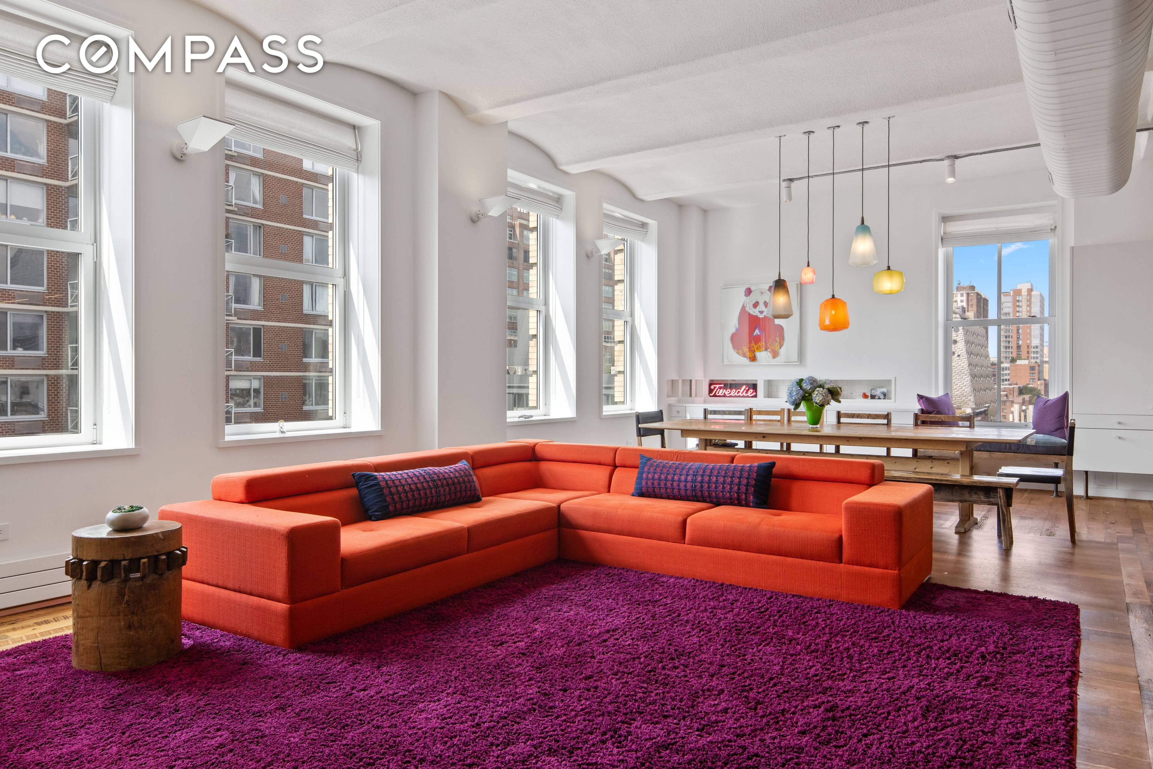 A sophisticated balance of industrial chic and colors encapsulate this powerfully unique residence.