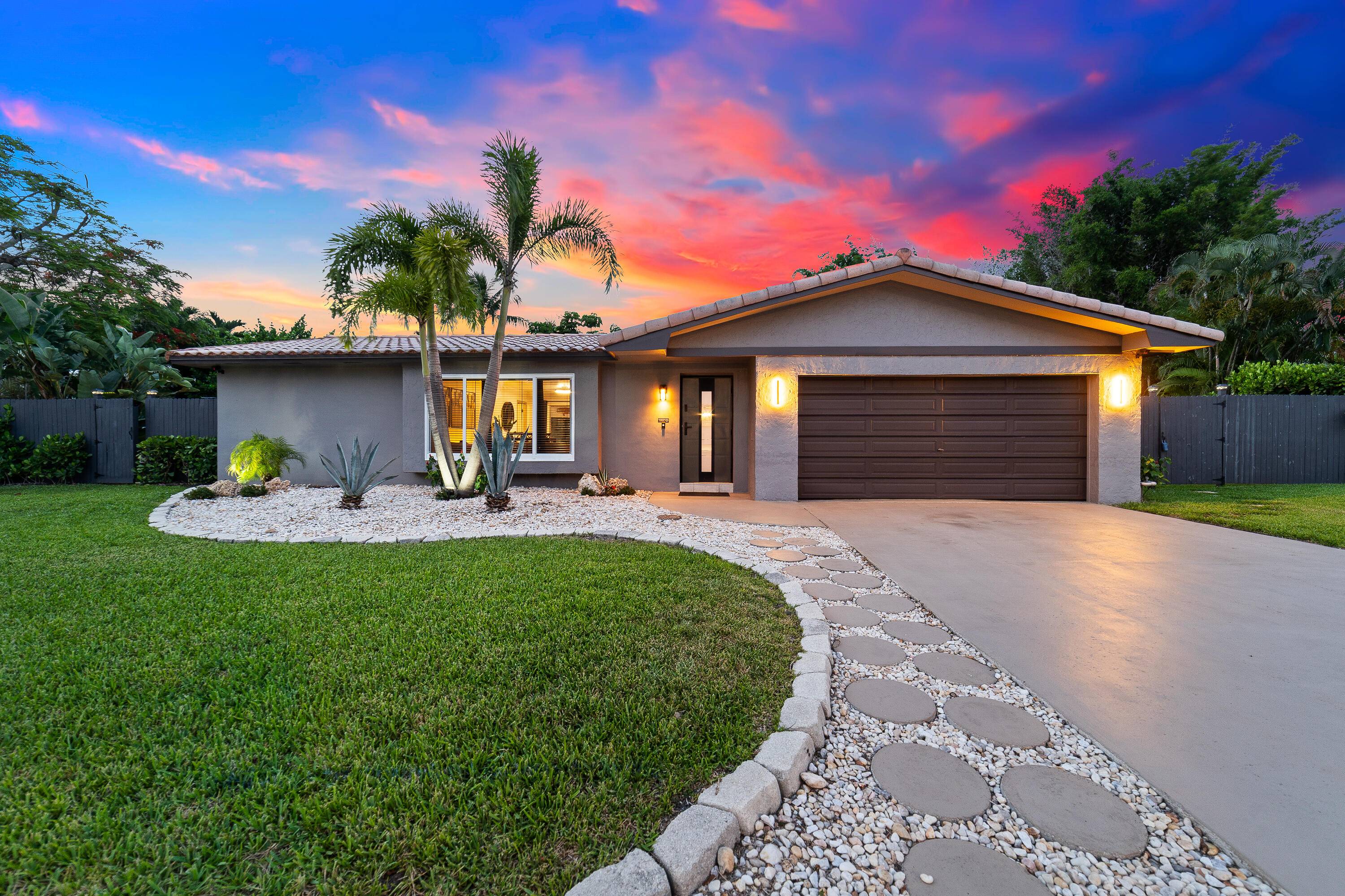 Tucked away at the end of a quiet cul de sac, this beautifully updated 4 bedroom, 2 bath home in Boca Raton Square offers comfort, privacy, and style.
