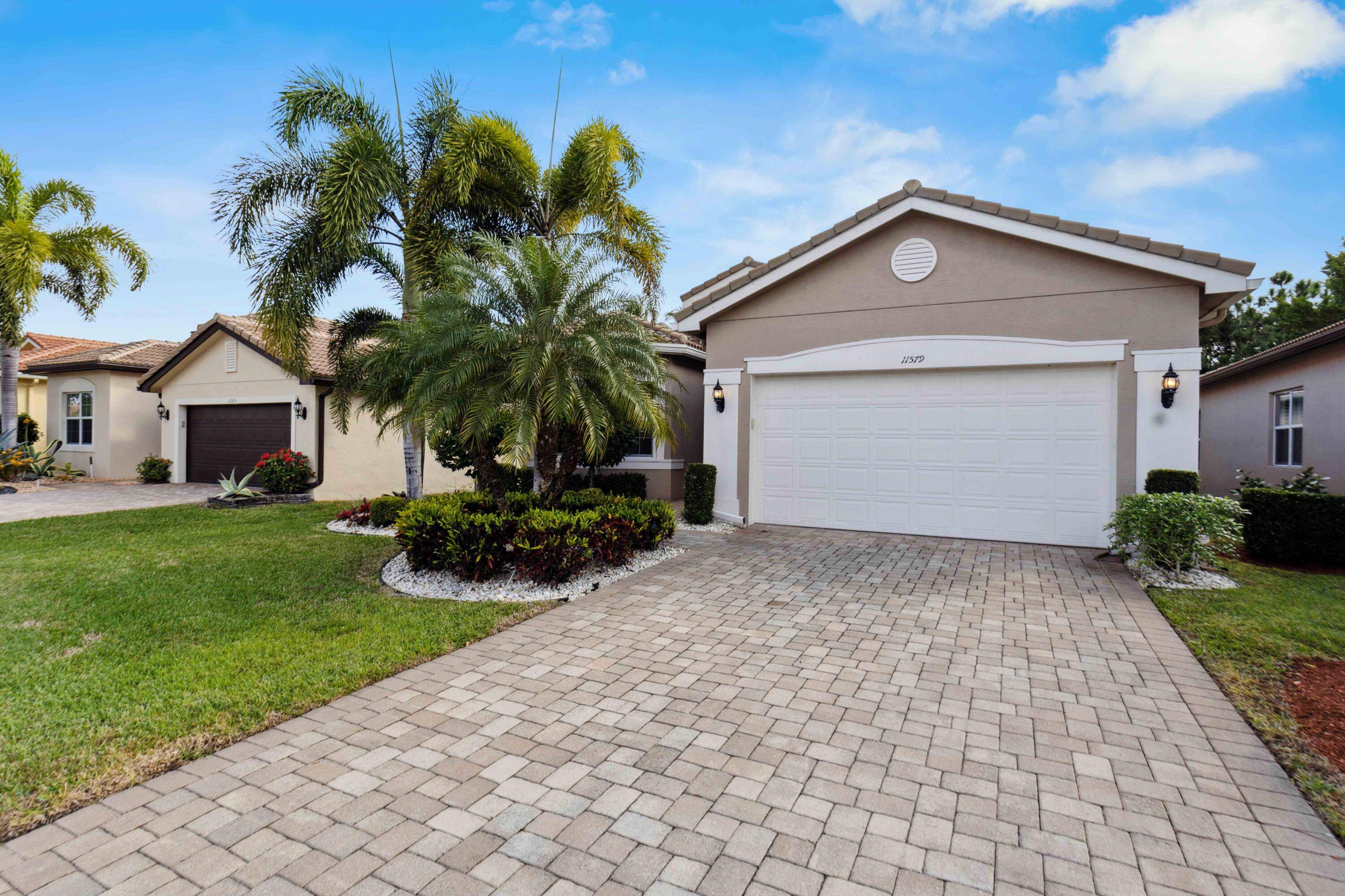 This rarely available ''Bimini'' model is situated on a lushly landscaped private lot boasting Impact windows doors, diagonally laid Porcelain Tile flooring, Coffered ceilings, Designer light fixtures, fans, and window ...