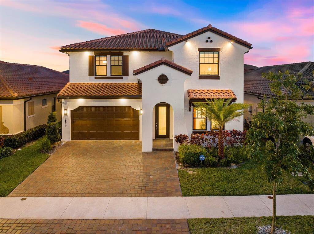 Stunning 4 bedroom, 3. 5 bath home with a bonus room, nestled on a serene waterfront lot, the property boasts a heated swimming pool spa, maintenance free AstroTurf surrounded by ...
