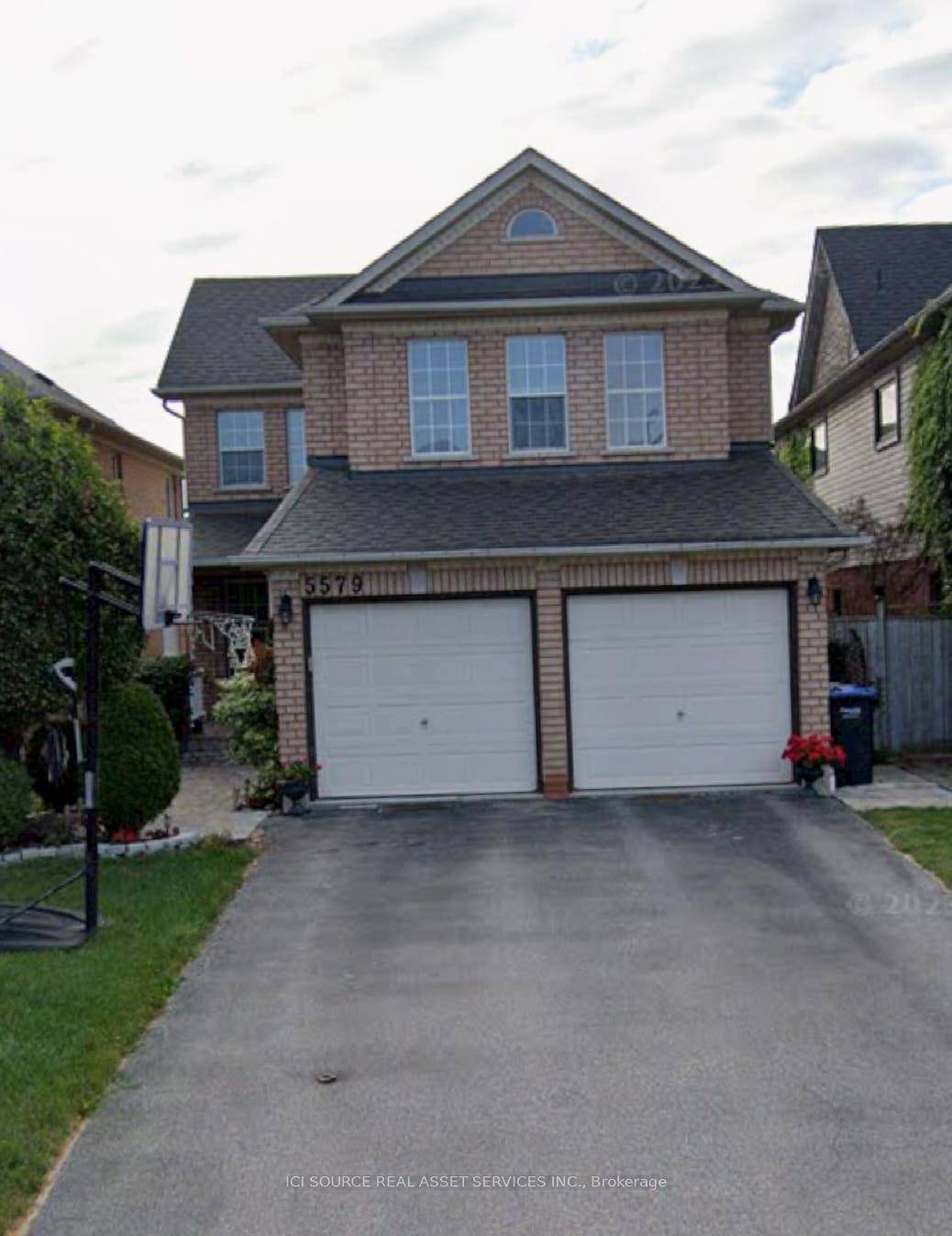 This 4 bedroom home boasts around 3000 Square feet in a quiet street.
