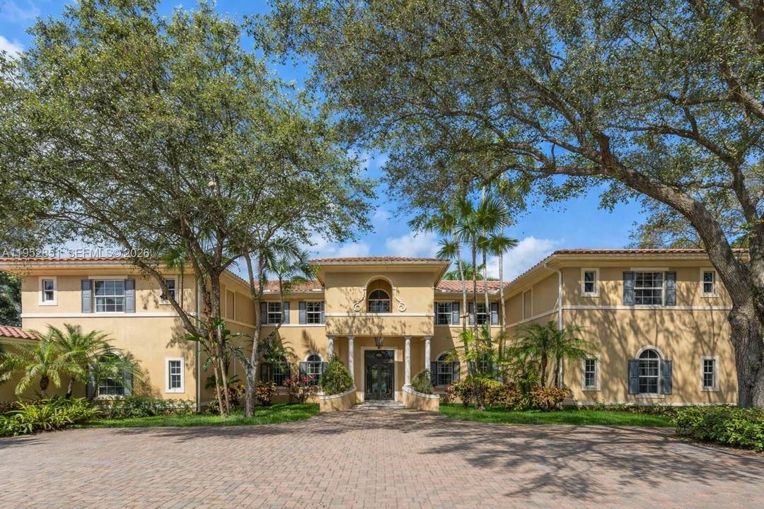 Mediterranean estate in prestigious Pinecrest, gracefully set on a 39, 204 sq ft lot.
