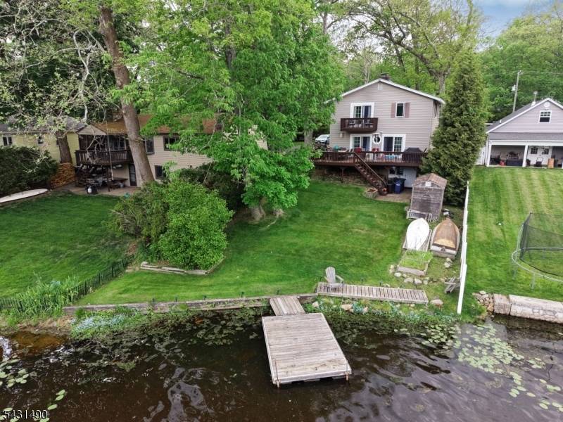 Experience lakefront living in this beautifully maintained 4 bedroom, 1.
