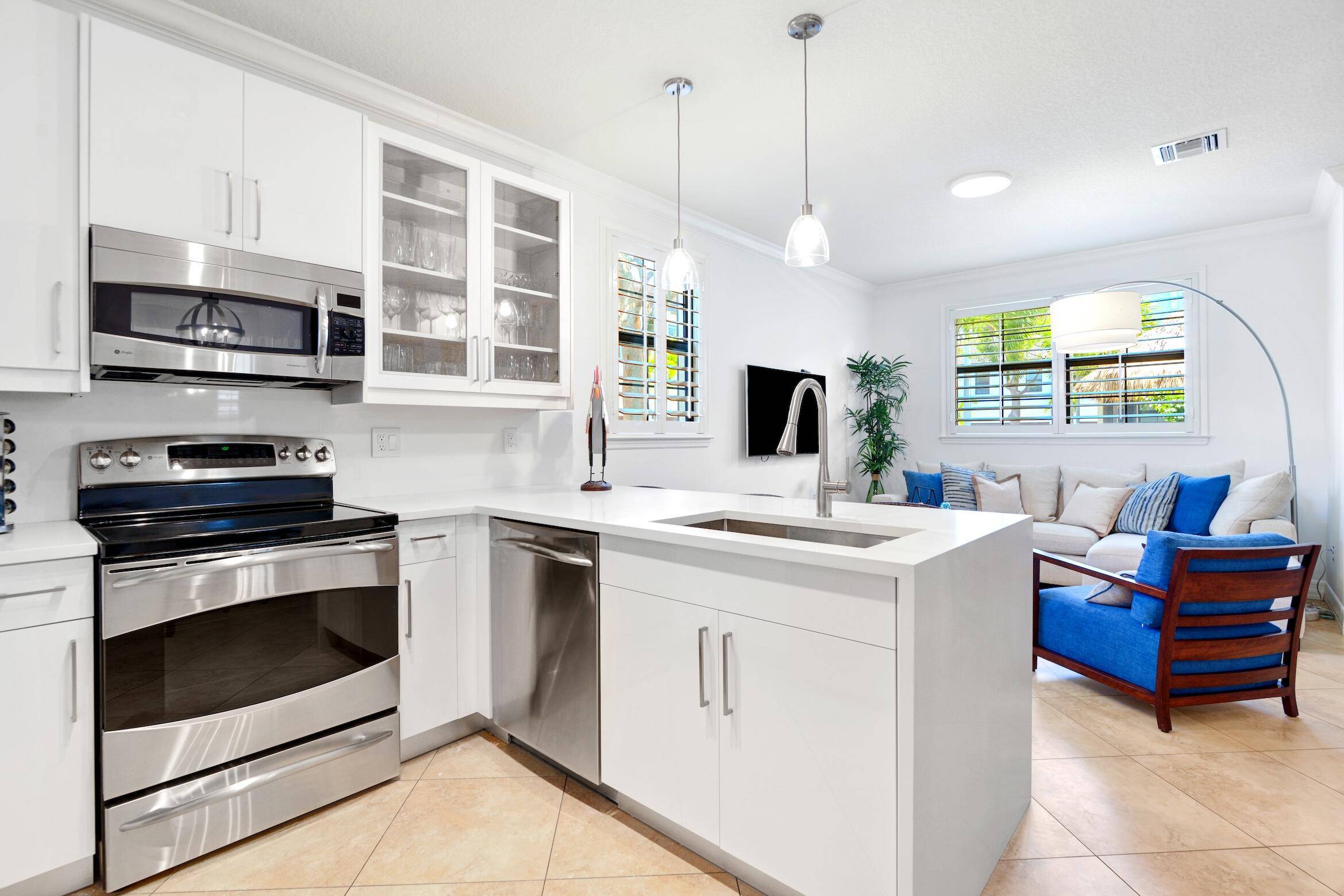 Beautiful 3 bedroom corner townhouse with 2 car garage just across from the beach and near trendy restaurants and shops.