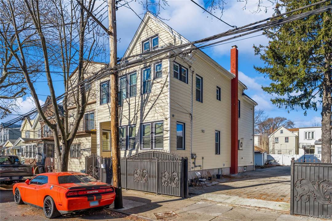 Step into modern comfort and timeless charm with this tastefully renovated two family home in the heart of Woodhaven, Queens.