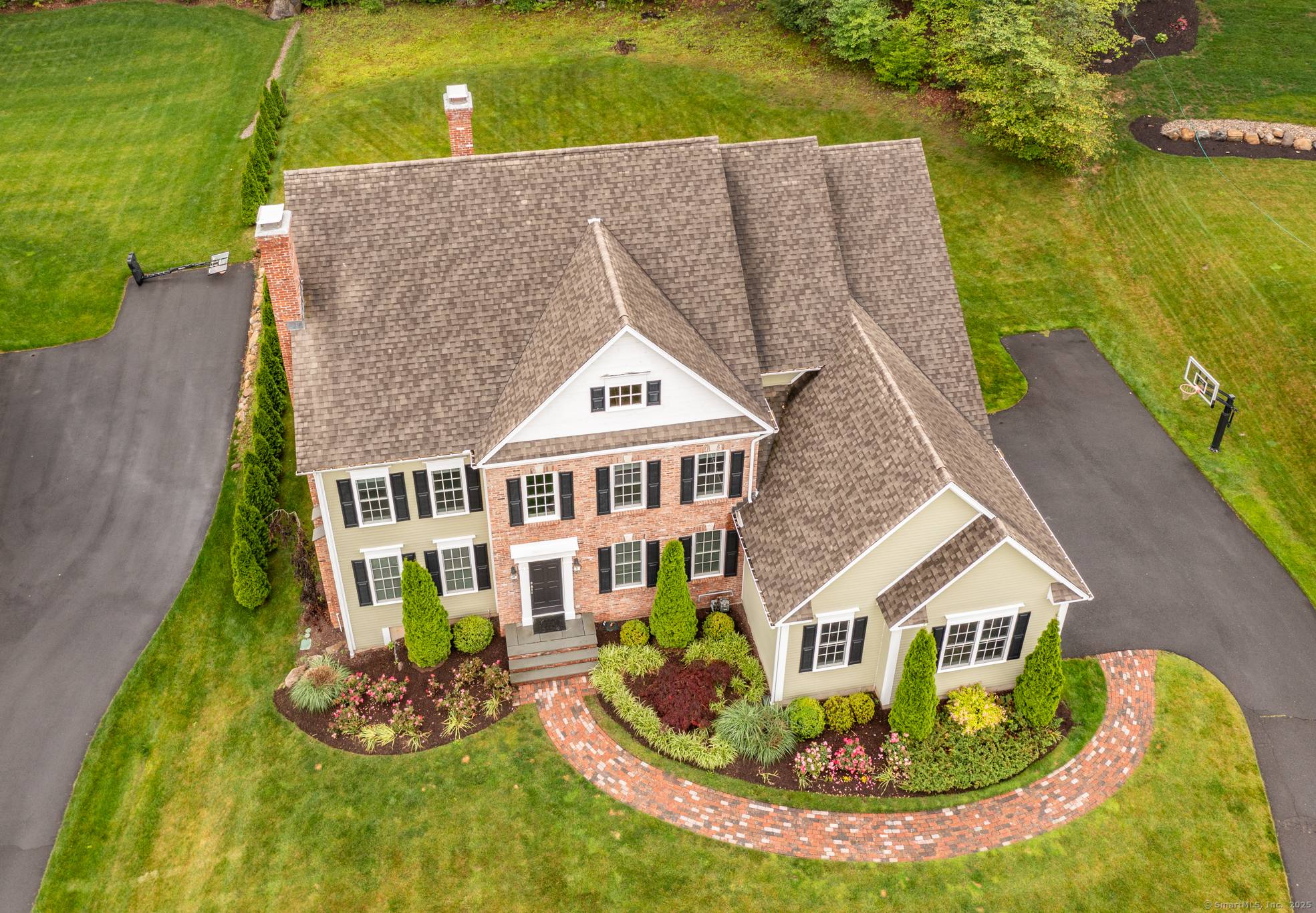 Seamless luxury at its finest, showcasing this home's master craftsmanship and masonry at every turn.