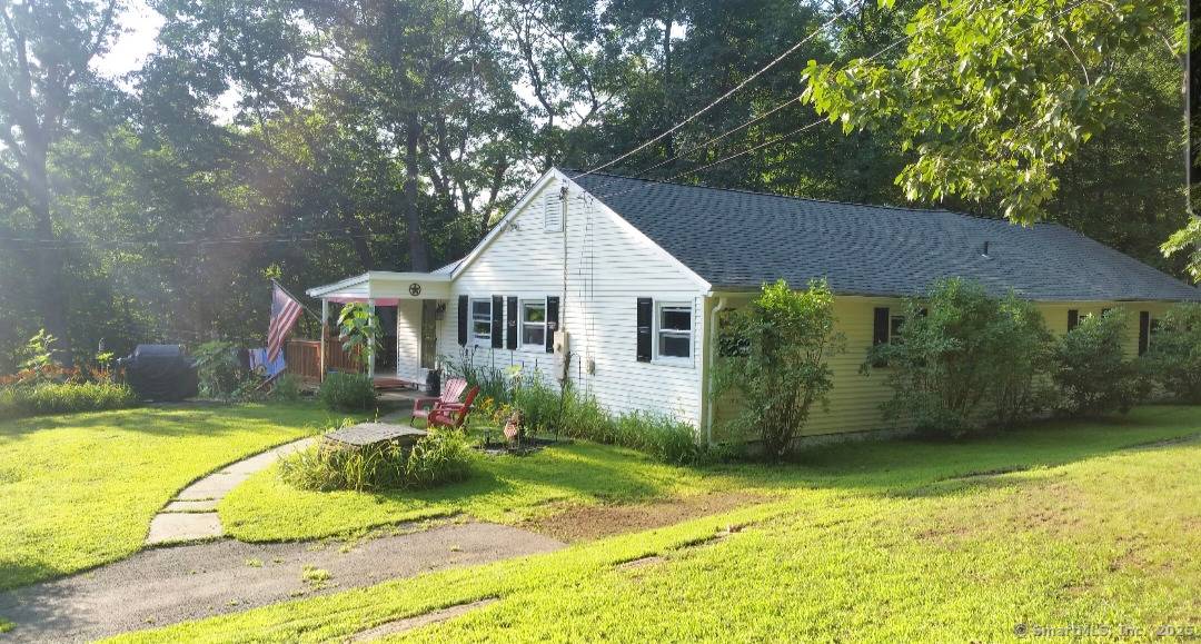 Sprawling 3 bedroom 2 bath ranch with 2 car detached garage barn on mostly level 1.