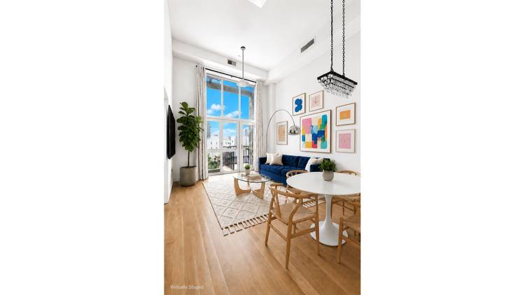 Welcome to one of Williamsburg's most distinctive homes, a light filled two story loft with soaring 14 foot ceilings and an exclusive 400 SF roof deck directly off your apartment ...