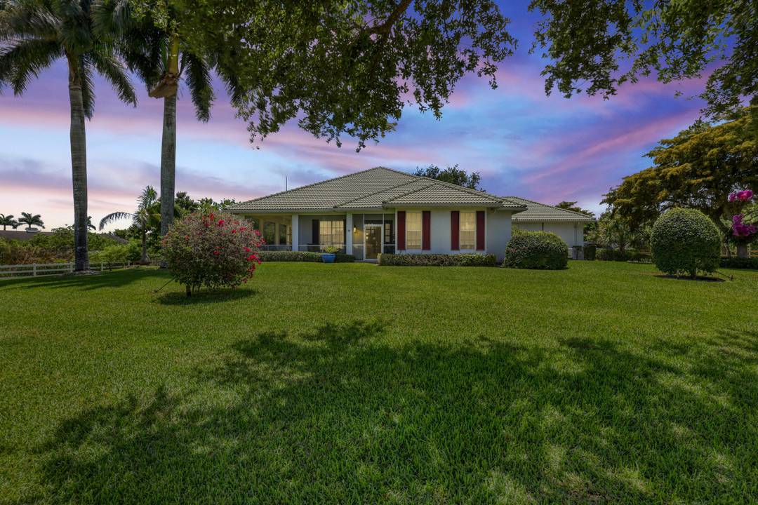 Experience luxury equestrian living in the prestigious gated community of Palm Beach Point.
