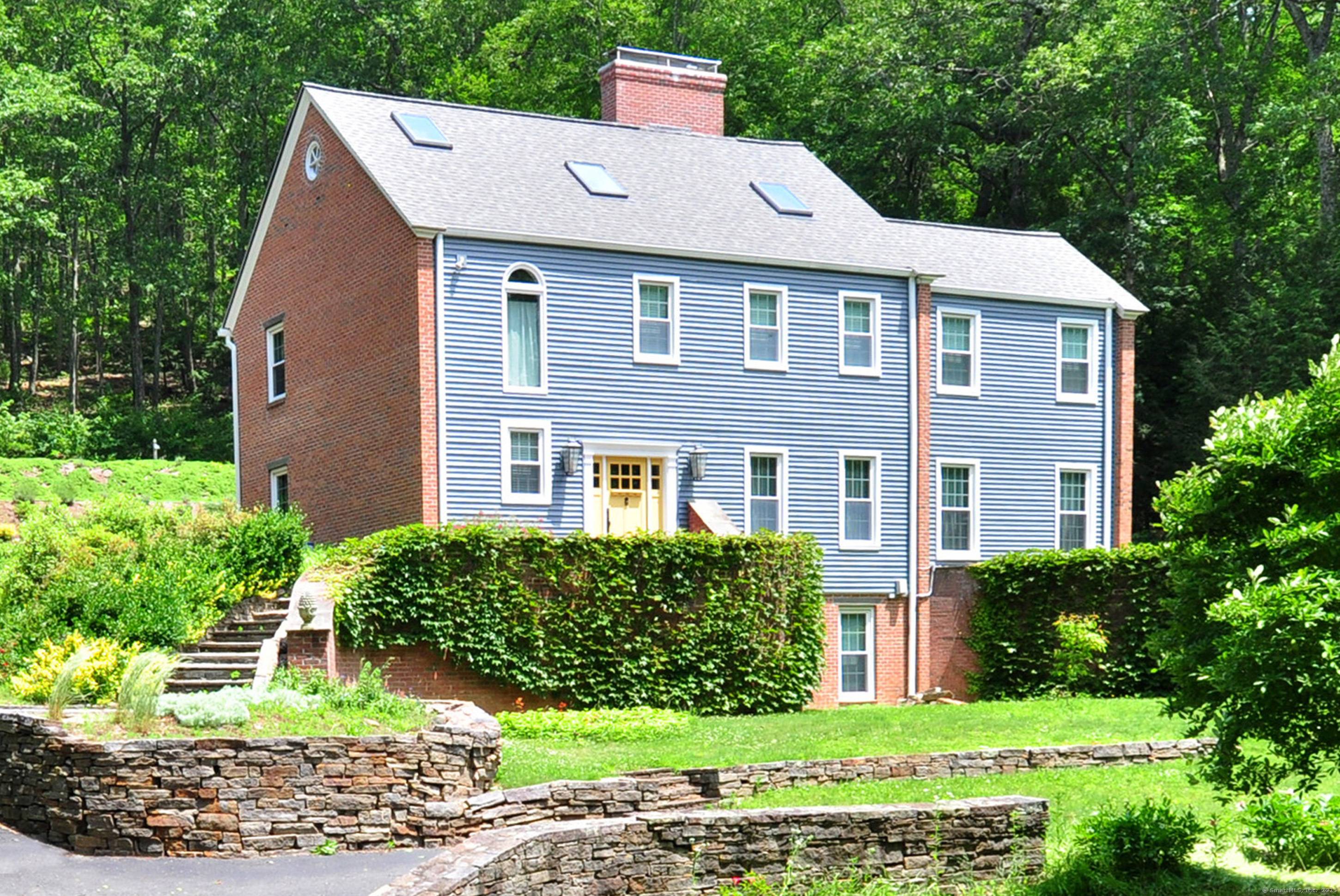 Welcome home to this beautifully updated North Granby gem, majestically set on 2.