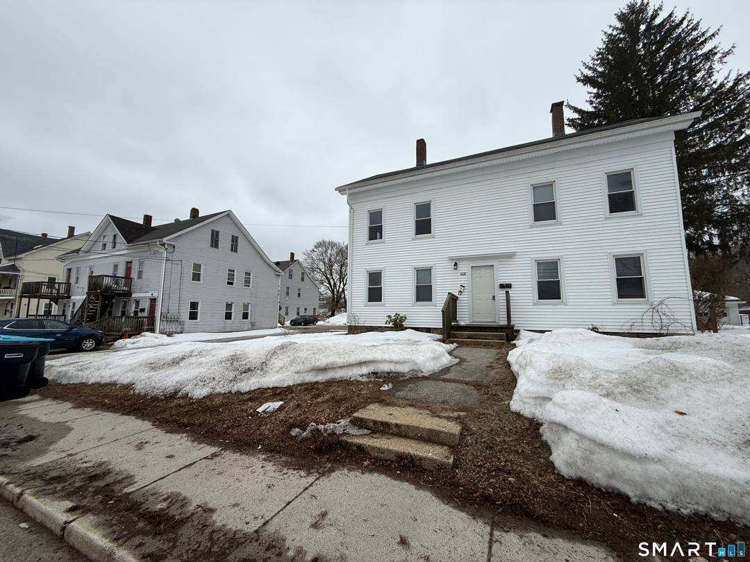 9 Unit multi family property consisting of 4 buildings on two adjoining parcels.