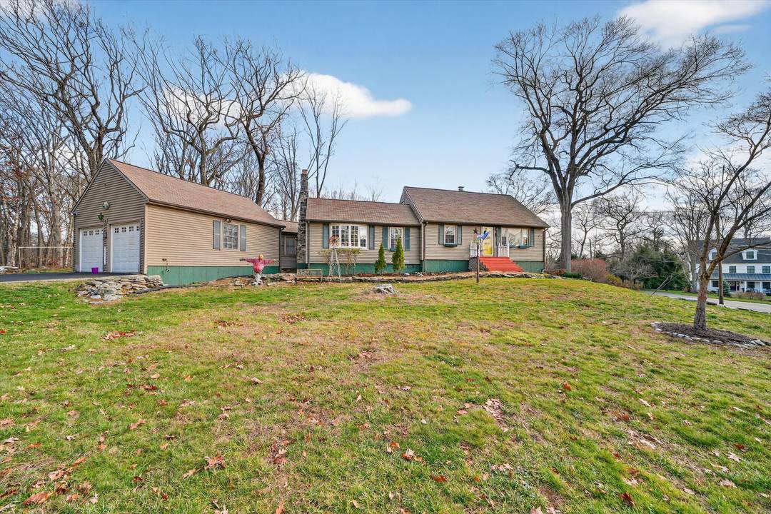 Nestled in the highly desirable Lake Hills neighborhood of Fairfield, 246 Romanock Road offers a warm and welcoming Cape style home set on a beautifully landscaped 0.