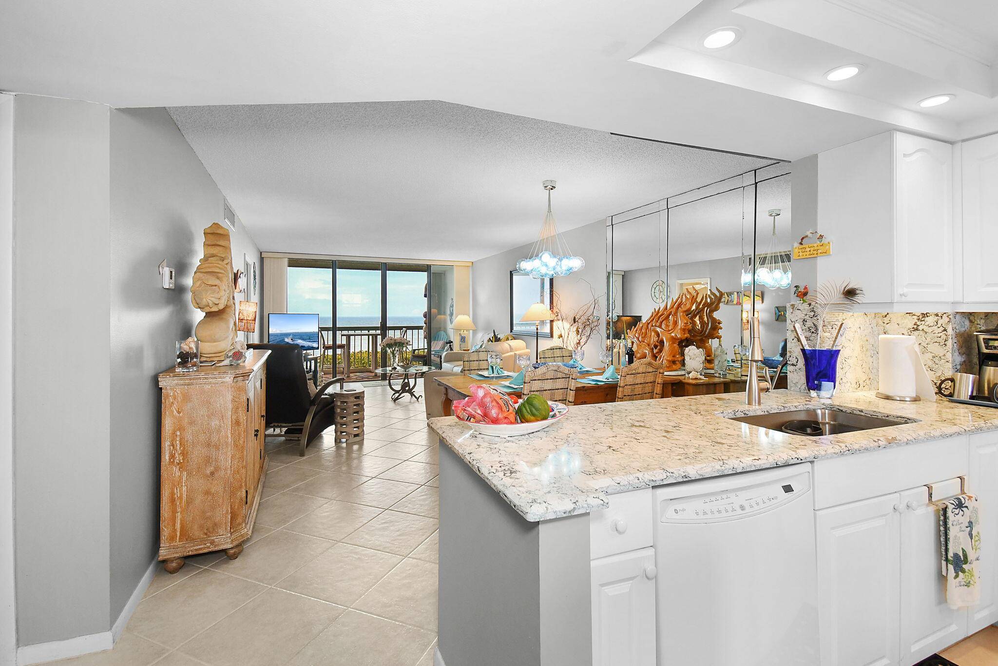 Stunning ocean front condo, located on the 3rd floor, this unit features ceramic flooring tiles and luxurious quartz countertops.