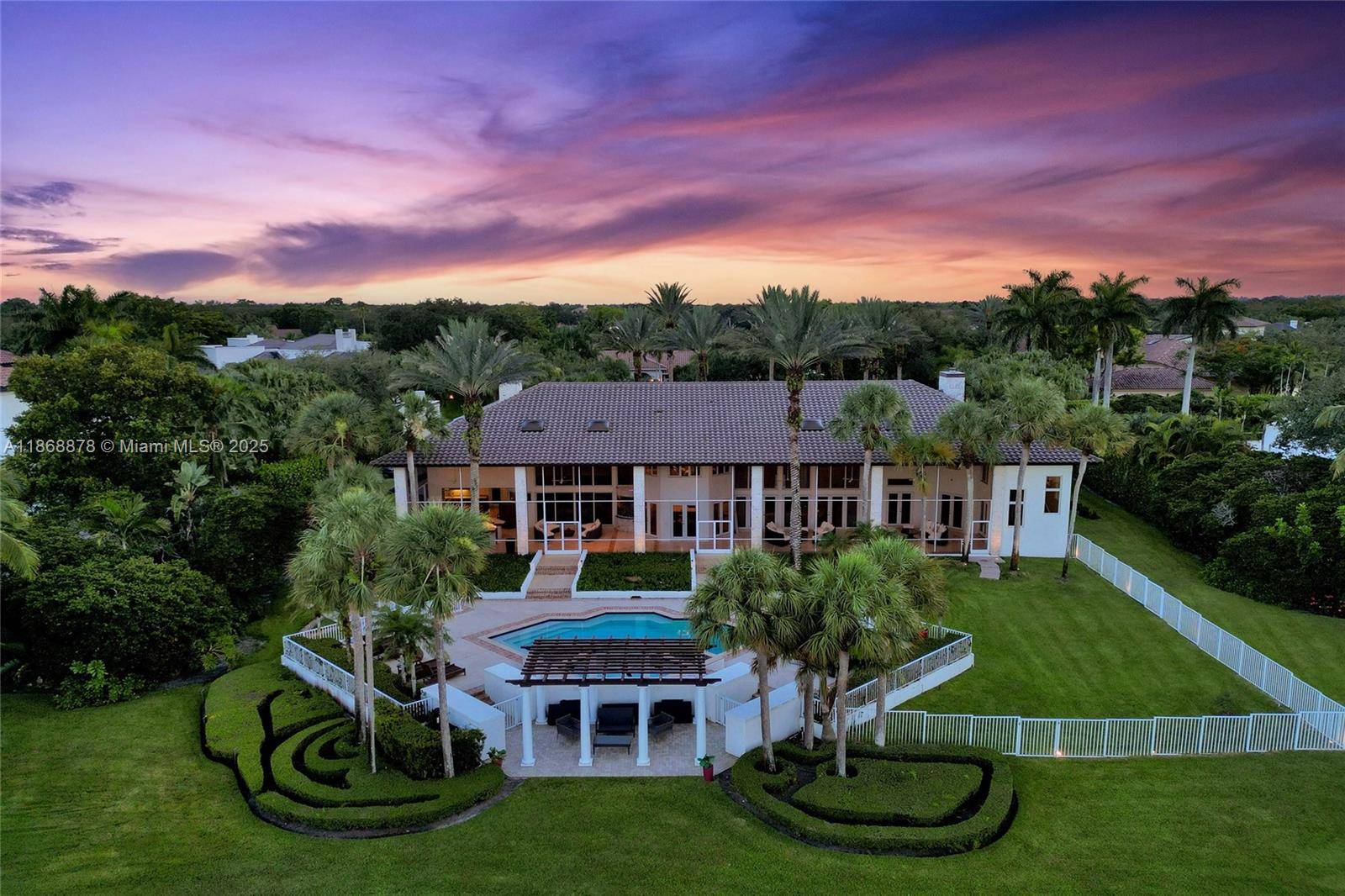 Discover timeless elegance in this Spectacular Custom Estate situated on a private cul de sac lot in the prestigious Windmill Ranch Estates.
