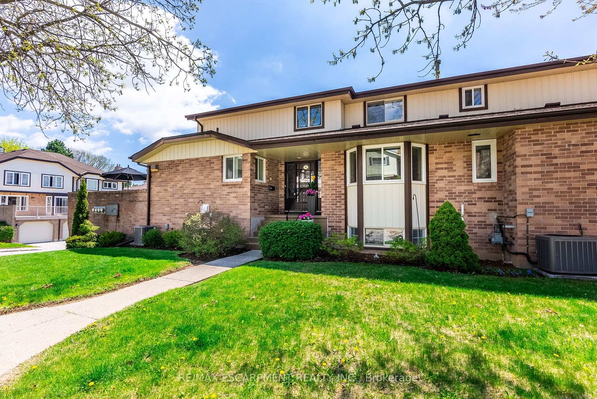 Nestled in the sought after Tyandaga neighbourhood, this beautifully maintained 3 bedroom, 4 bathroom townhome offers exceptional space and comfort with a rare double car garage with inside entry.