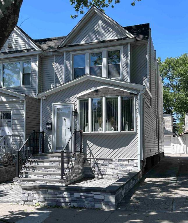 Welcome to this charming, fully renovated two family home nestled in the heart of Glendale, Queens, just off Otto Road.