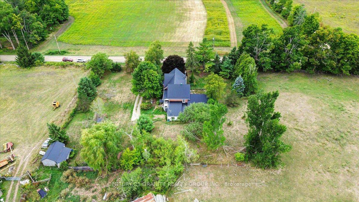 This timeless and stately 1905 farmhouse offers a rare blend of architectural beauty, rural charm, and modern functionality.