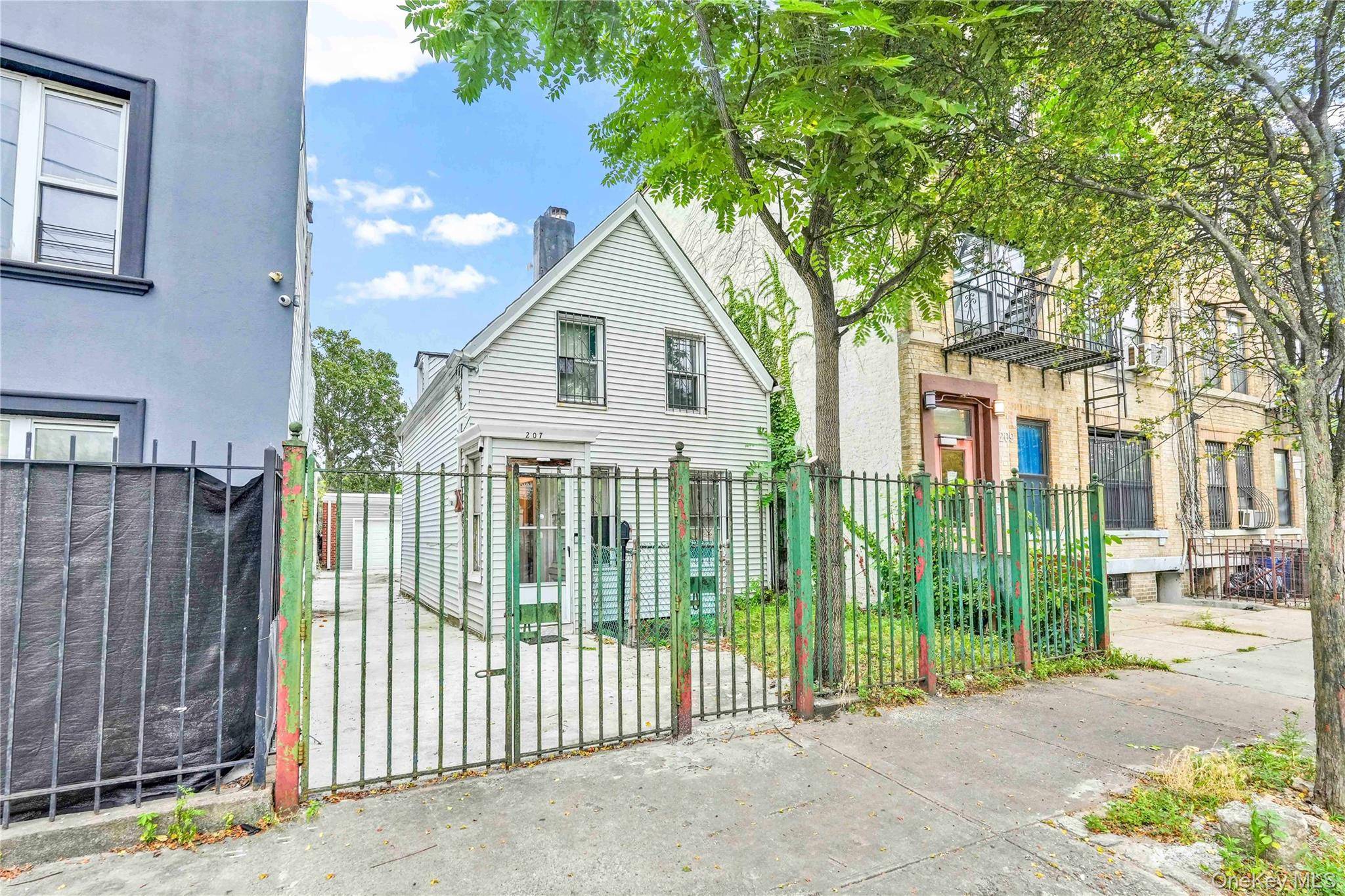 Introducing 207 Bradford Street a property full of potential, ideal for those seeking a home to personalize or a smart investment in a growing neighborhood.