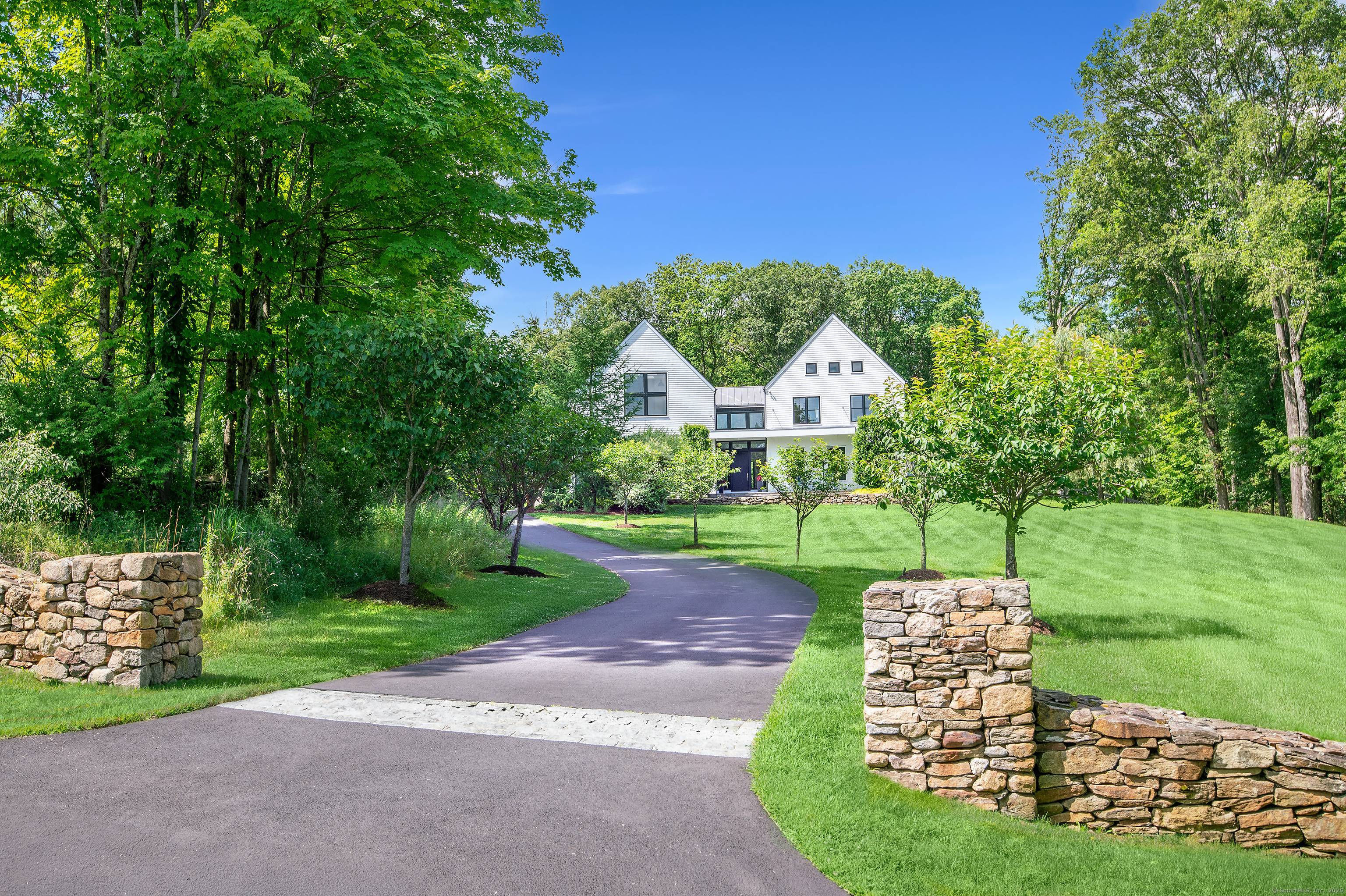 Exceptional custom built home by top tier builder Fletcher Custom Homes and designed by acclaimed architect Chris Pagliaro with interiors by Mark Finley.