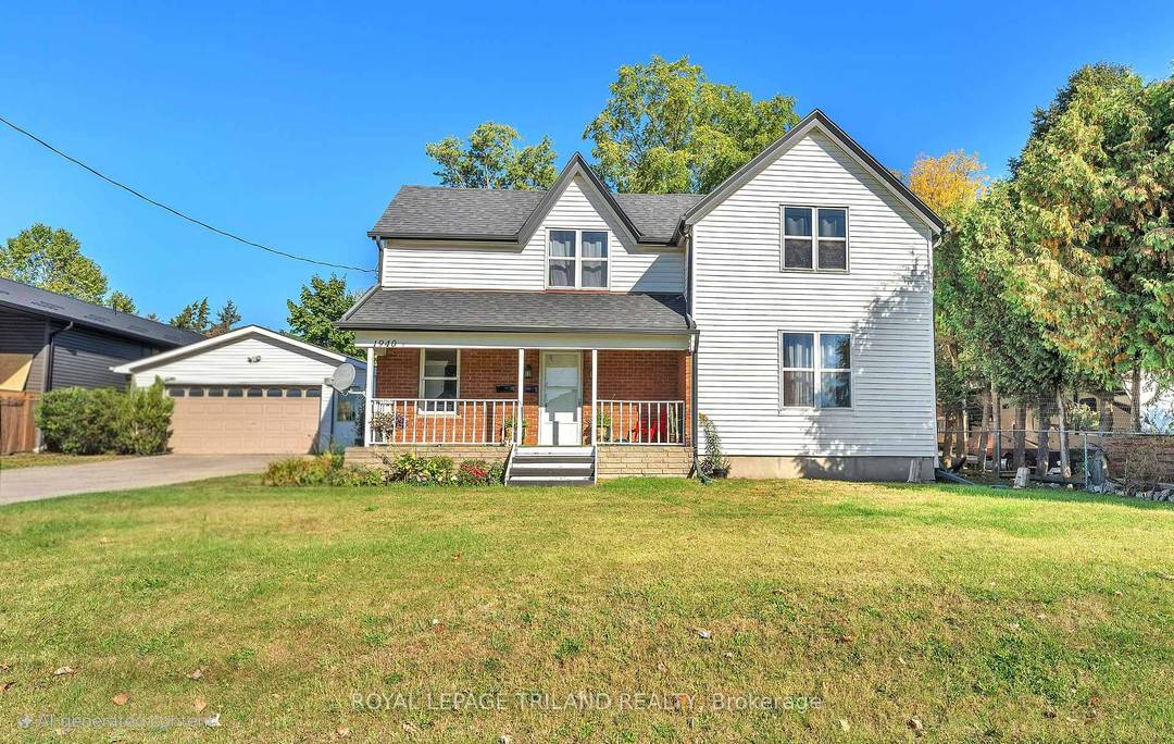 Fantastic Duplex with Development Potential sits on a large 80x150 ft lot with an oversized two car garage !