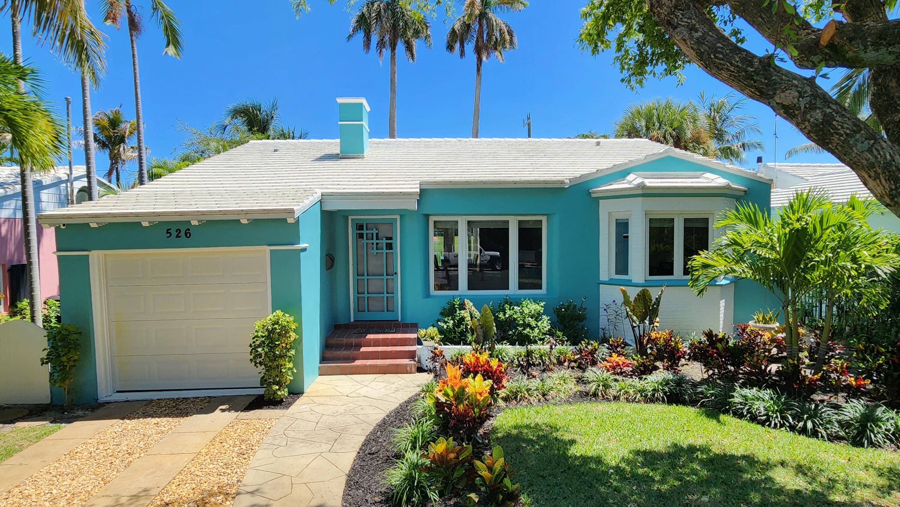 This luxurious 3 bedroom 2 bath home sits directly on famed Lake Worth Golf Course and has direct Intracoastal views from the spacious back yard that features a brand new ...