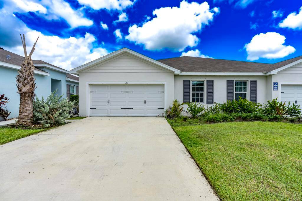 Discover this lovely 3 bedroom, 2 bath villa located in the new development of Avalon Crossing.