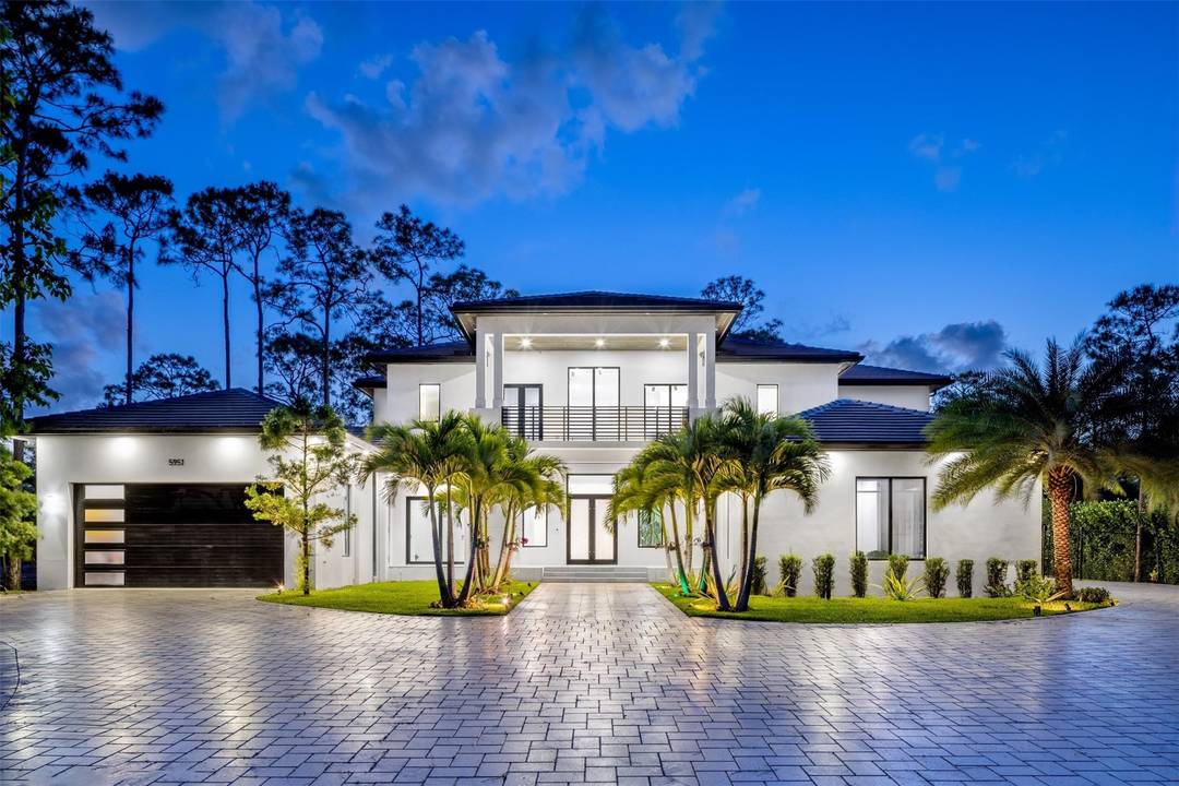 Experience refined living in this meticulously crafted, gated luxury estate, in the heart of Parkland.