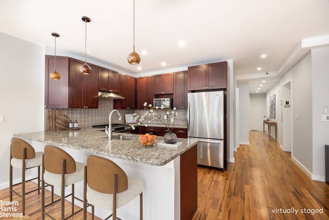 Residence 2 commands an entire floor in a boutique condominium building in the vibrant and authentic East Harlem neighborhood.