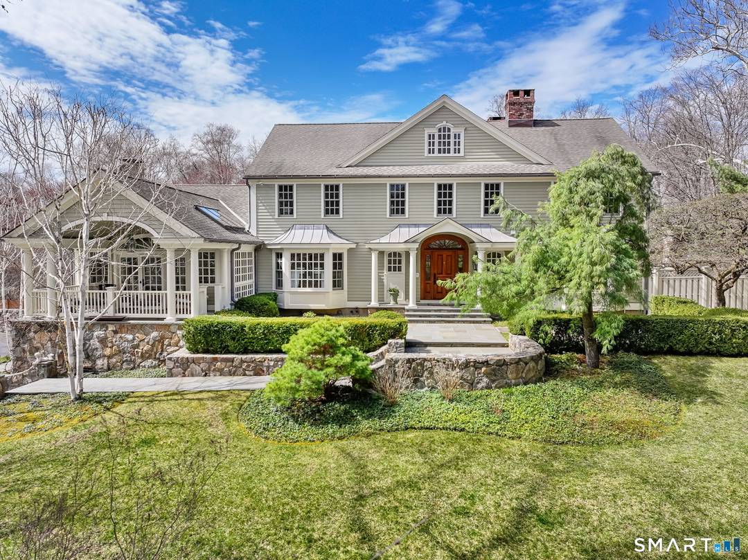 Designed by acclaimed architect Dinyar Wadia, this exceptional 5 bedroom estate is set on breathtaking, park like grounds just minutes from downtown New Canaan.