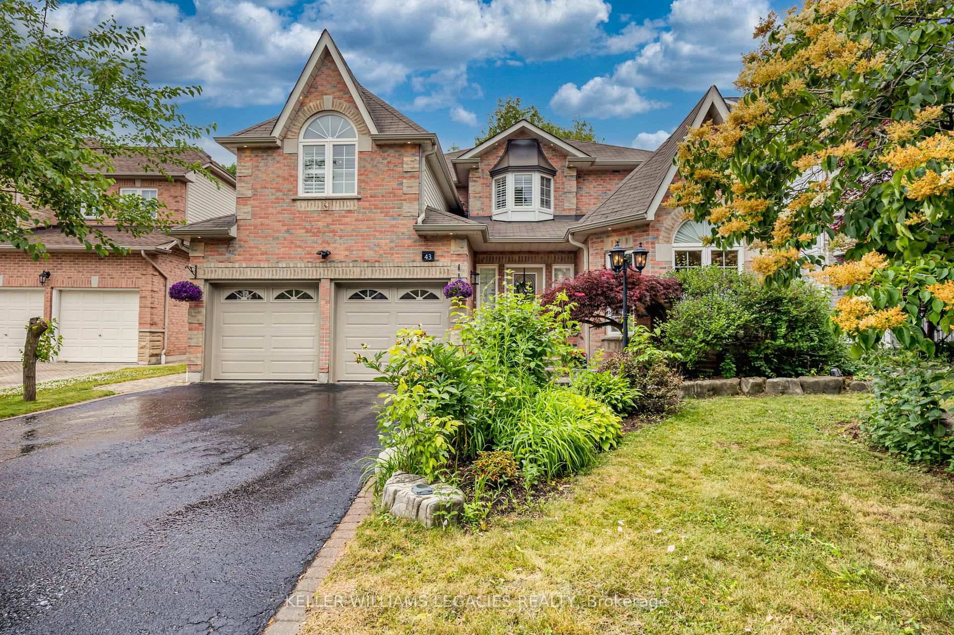 Absolutely stunning 4 bed, 4 bath Monarch built executive home on a premium west facing ravine lot.