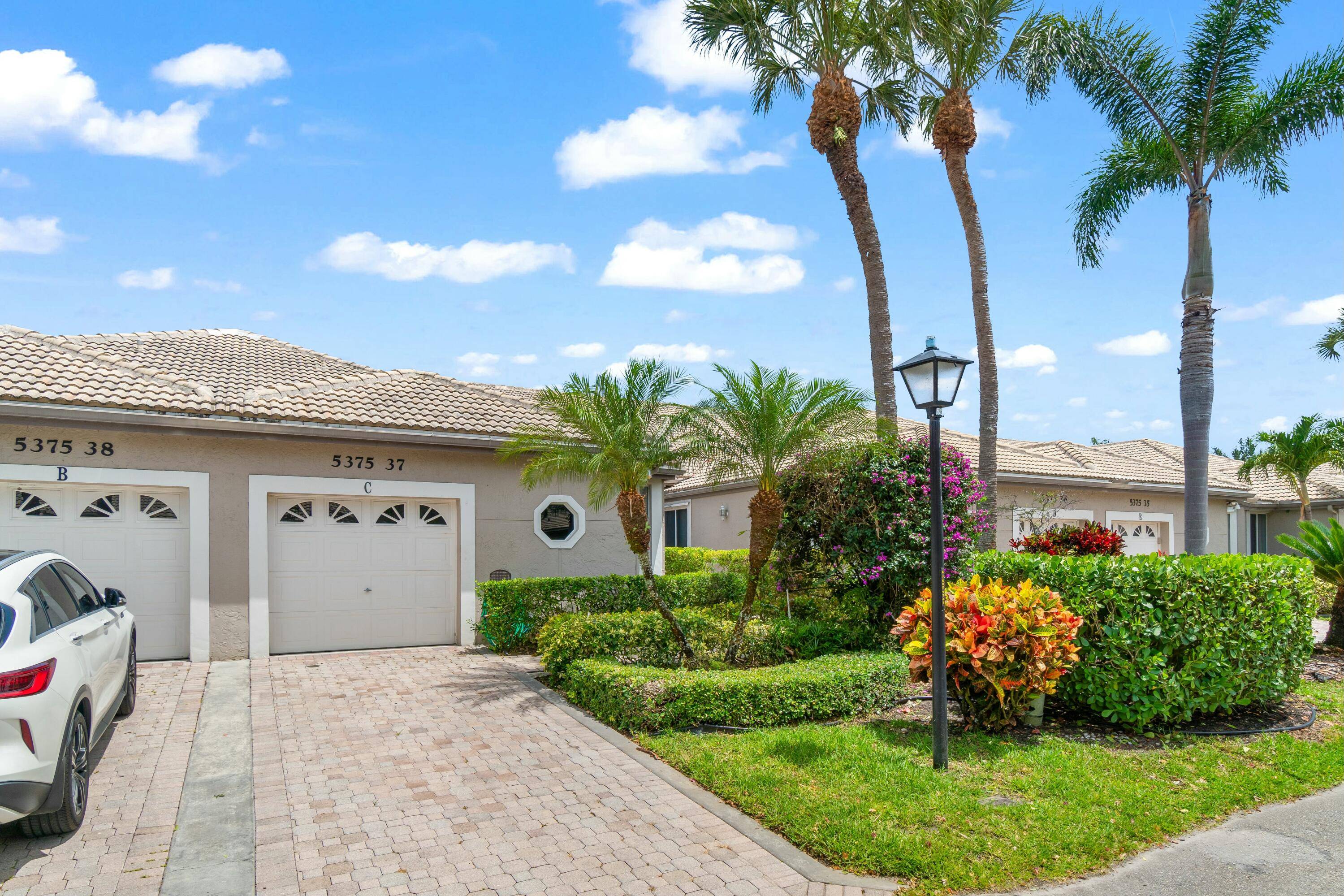 Welcome home to this meticulous 3 bed 2 bath one story villa with soaring ceilings on the best waterfront lot in Monterey Lake.
