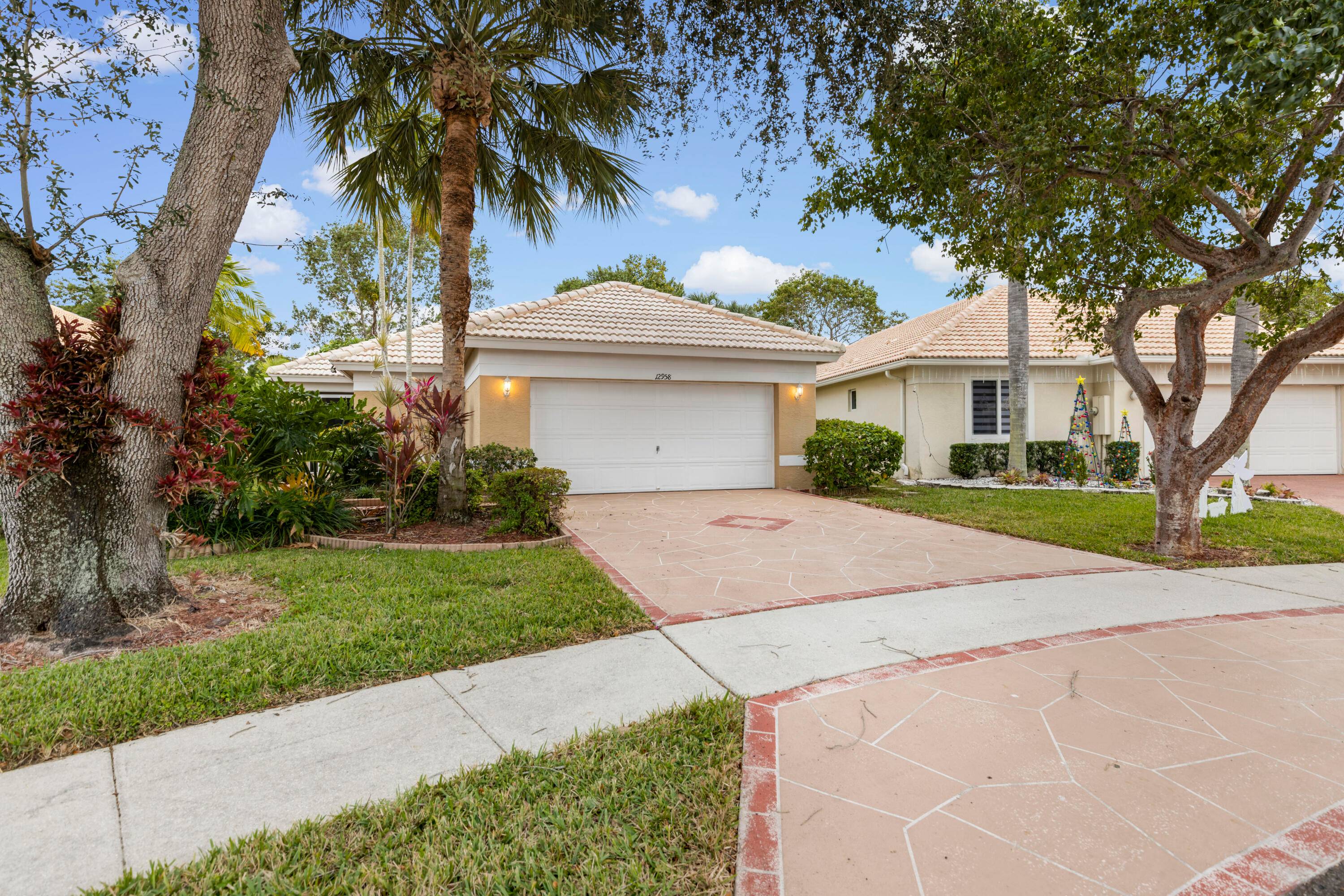 NEW ROOF installed March 2025 Nestled in the serene cul de sac of the development, this impeccable single family home offers a tranquil retreat with its picturesque private garden view.