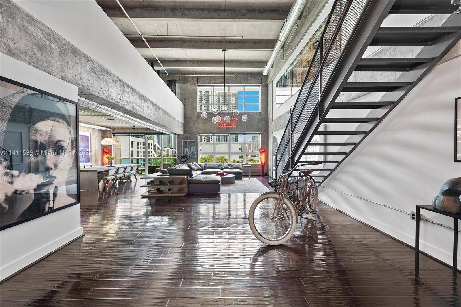 Presenting an extraordinary NYC style industrial loft with impressive 20' ceilings and beautiful wood flooring.