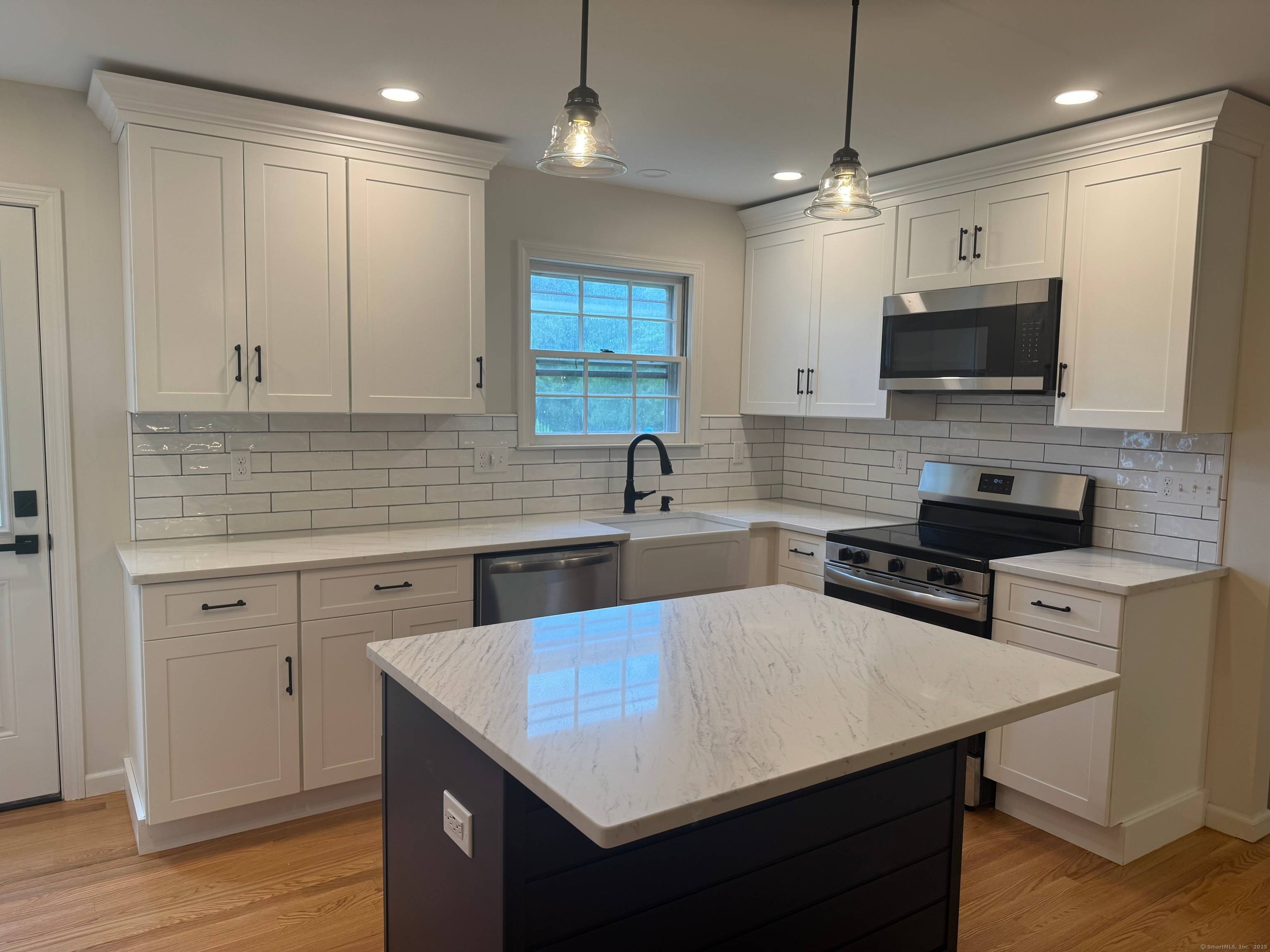 Welcome to 408 Hut Hill Road, where timeless charm meets modern convenience in this beautifully reimagined 4 bedroom, 2.