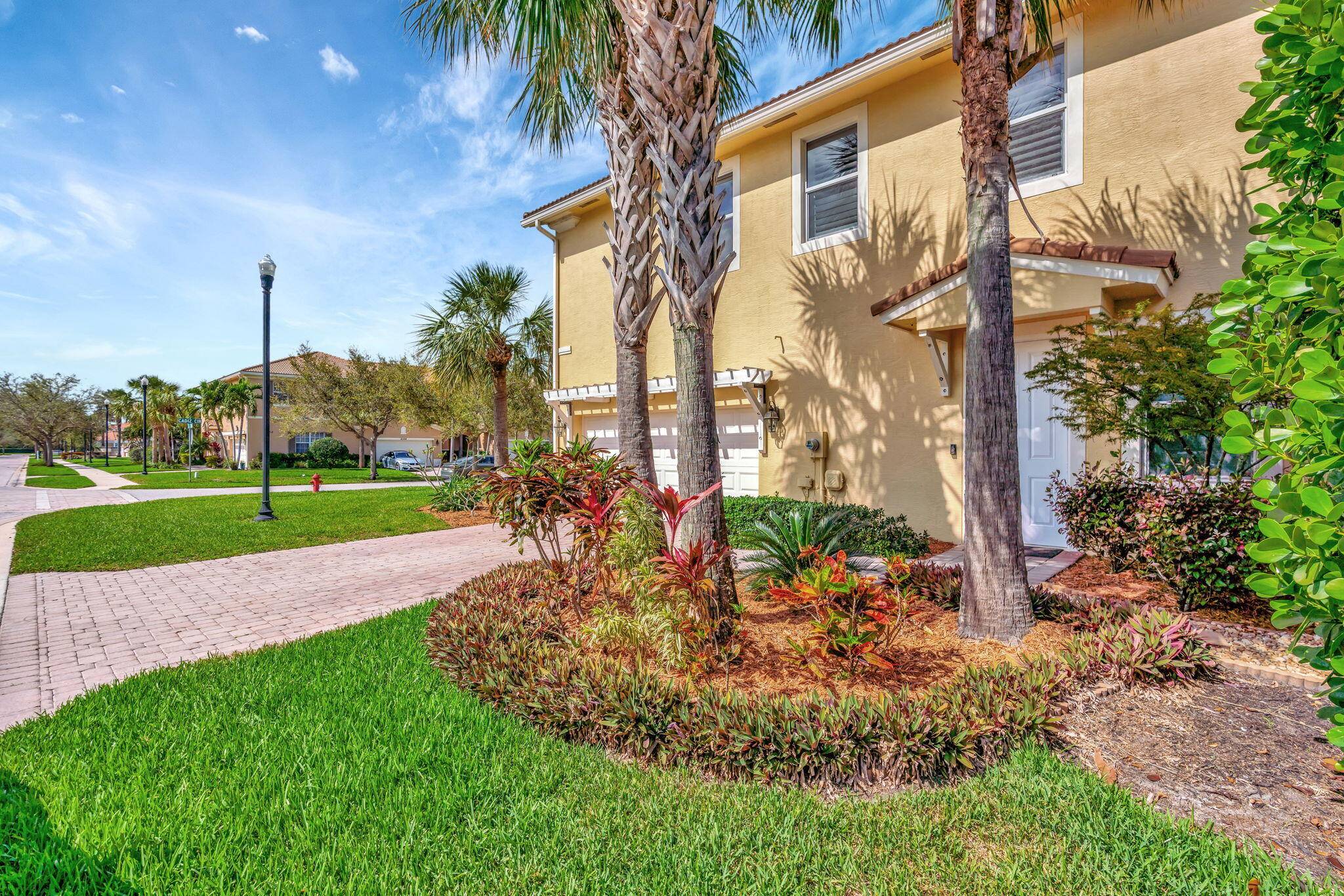 Bright, airy, and full of charm this corner lot townhome in Paloma has it all !