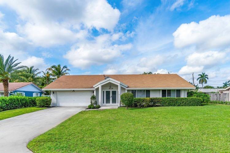 This stunning 3 bedroom plus office, 2 bath home on a spacious fenced lot is now available !