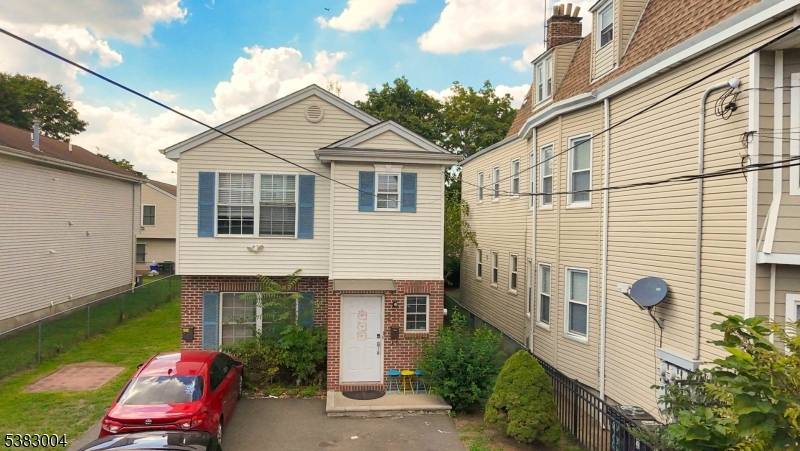 Welcome to this charming two family home built in 2003, offering the perfect blend of modern comfort and investment potential.