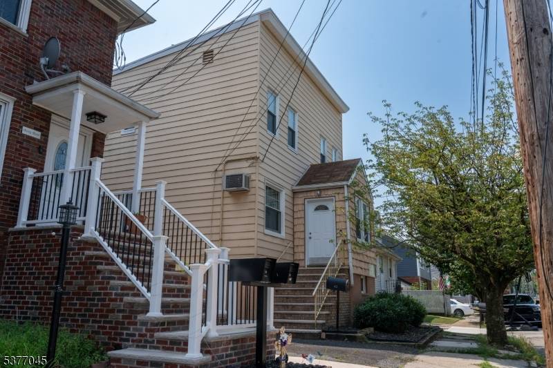 Versatile 2 family side by side home with spacious layouts in a quiet area.